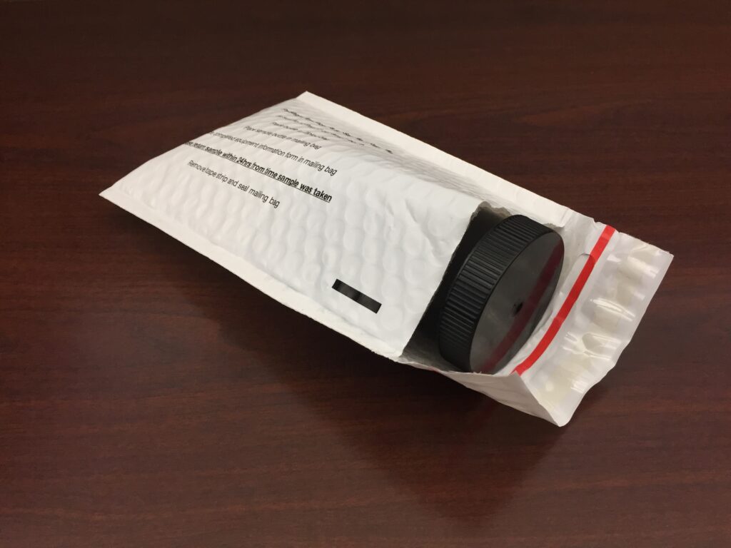 container in new mailing sleeve